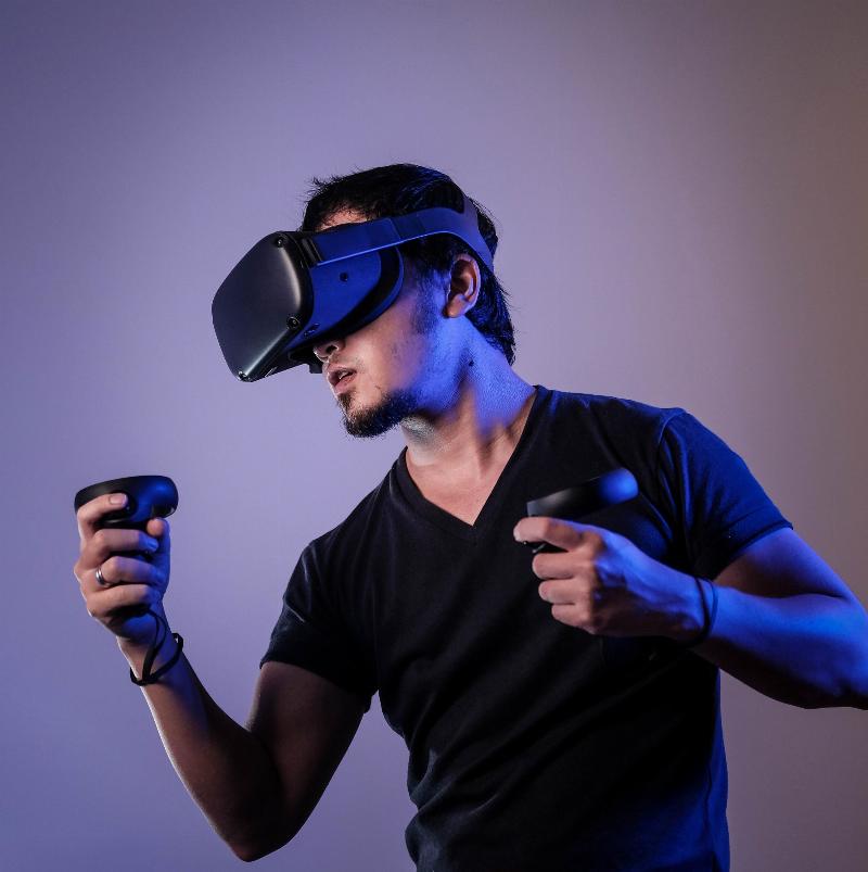 man wearing virtual reality gear in motion