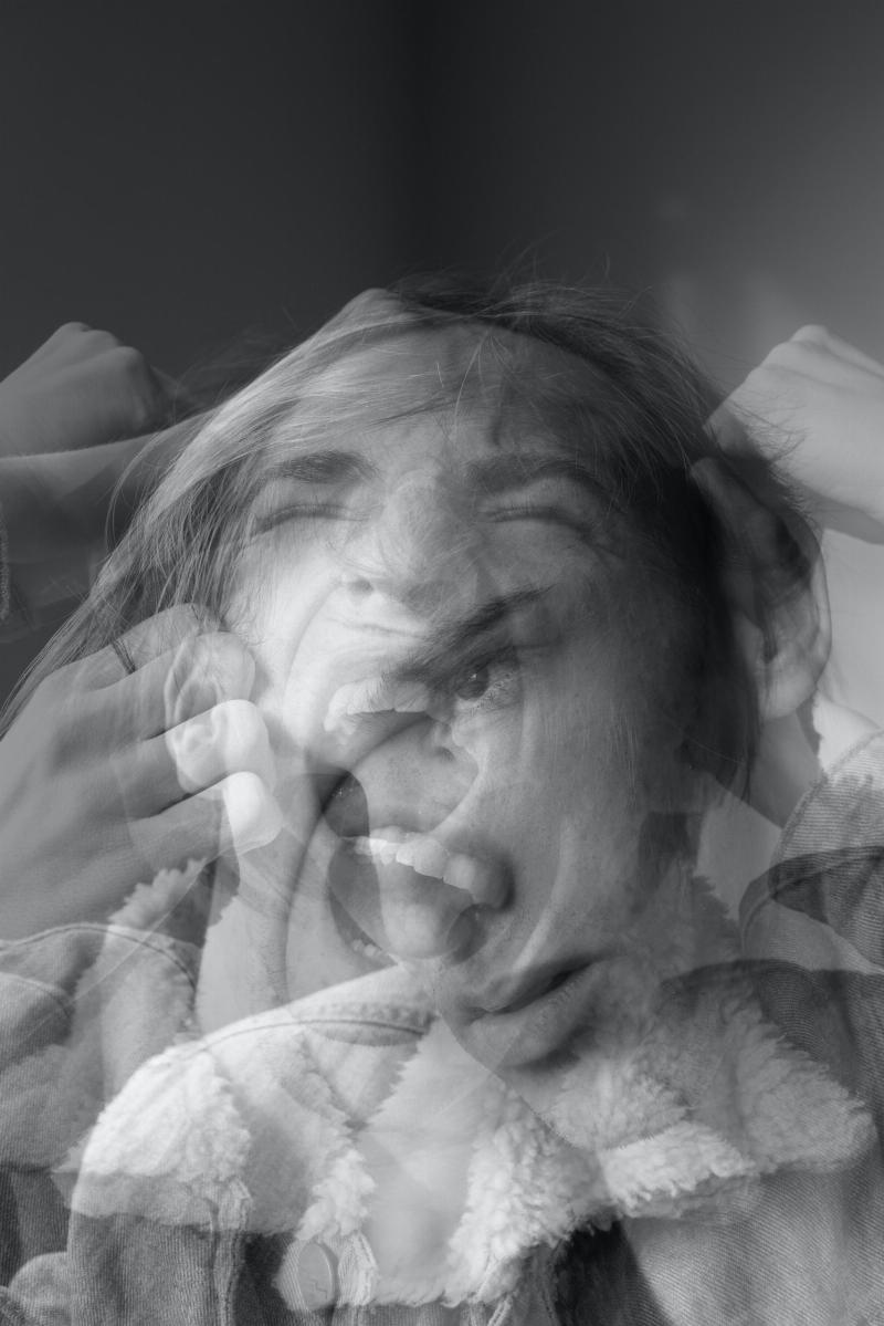 black and white overimposed pictures of woman screaming
