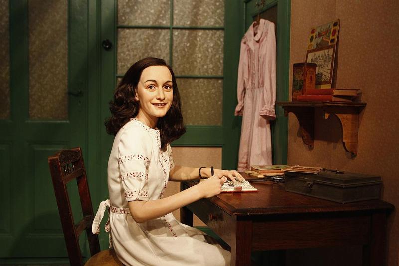 A wax figure of Anne Frank and their hideout reconstruction is unveiled at Madame Tussauds on March 9, 2012 in Berlin, Germany.