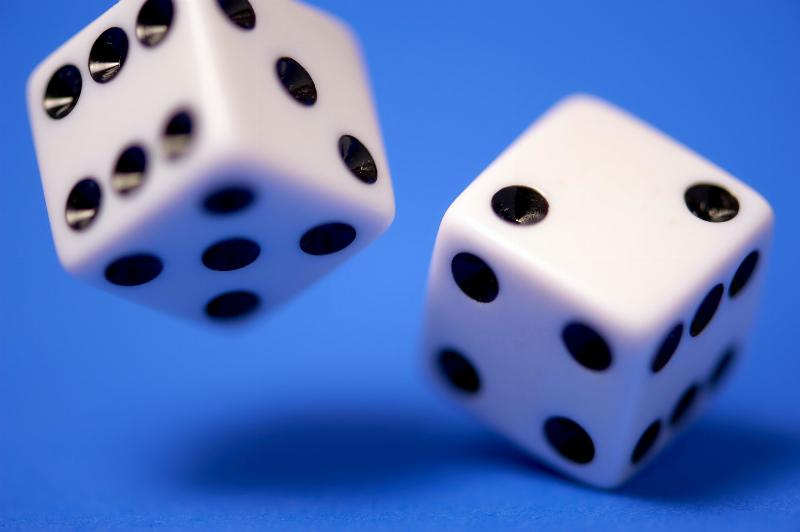 dice rolling on blue background