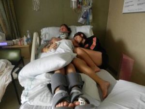 Danielle and her husband lay inhospital bed