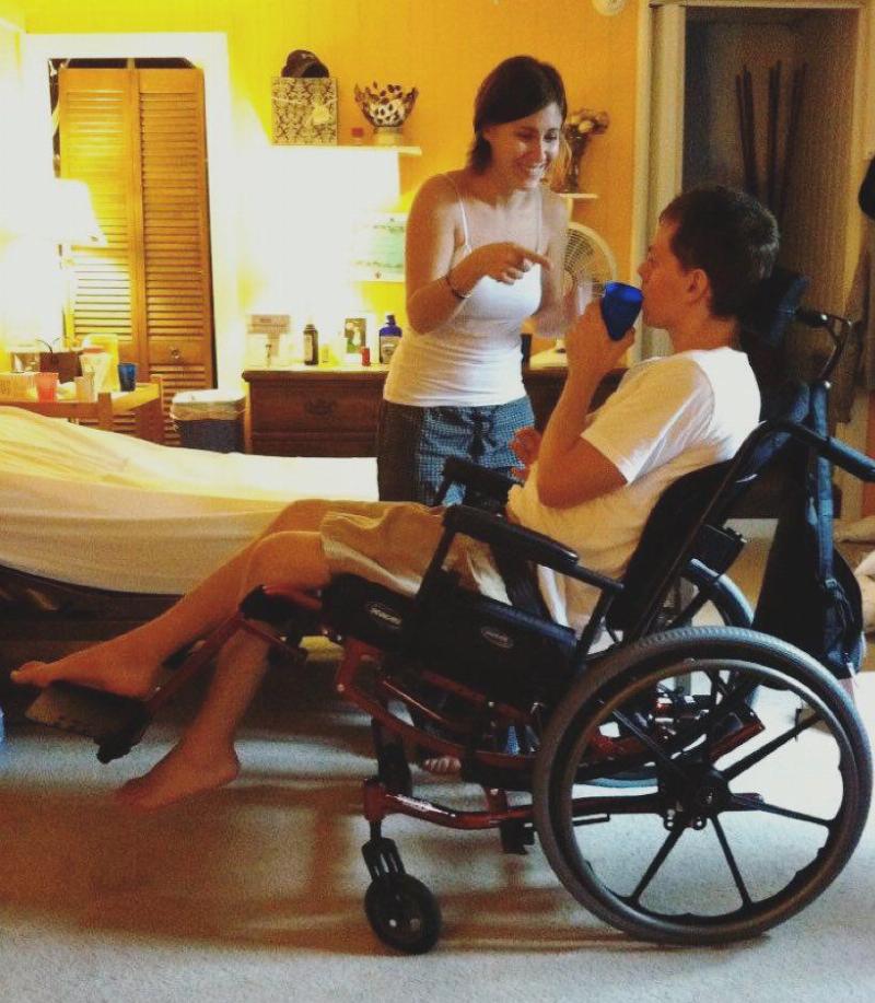 matt in wheelchair with his wife