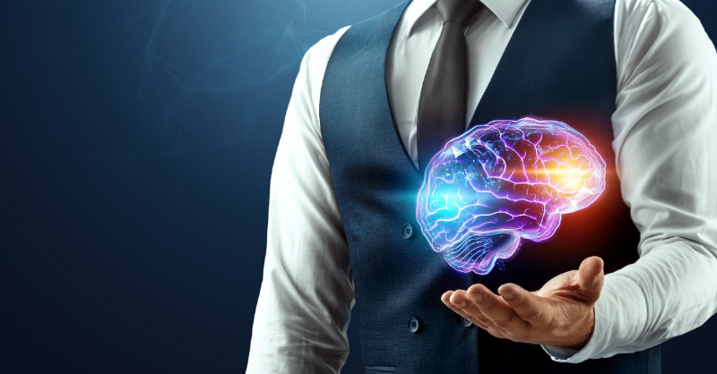 business man holding colorful hologram of the brain consciousness