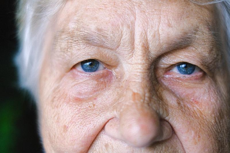 close up of old woman with blue eyes
