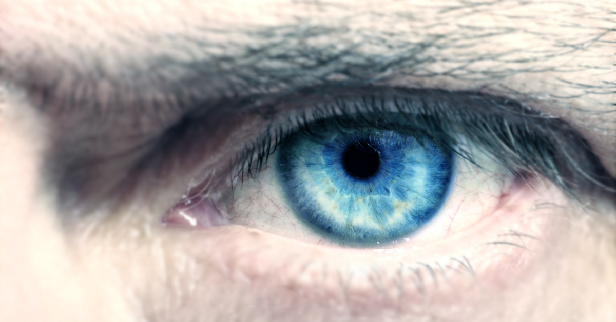 Indigo eye close up on a man's face