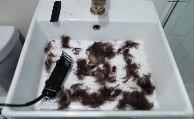 shaved hair in a sink