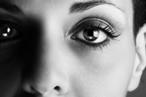 close up of woman's eye in black and white