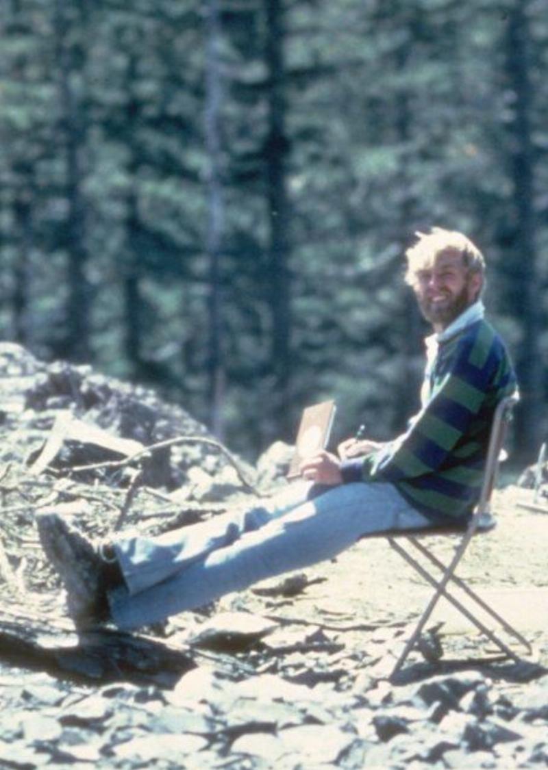 American volcanologist David A. Johnston sitting in a folding chair at Mount St. Helens, May 18, 1980.