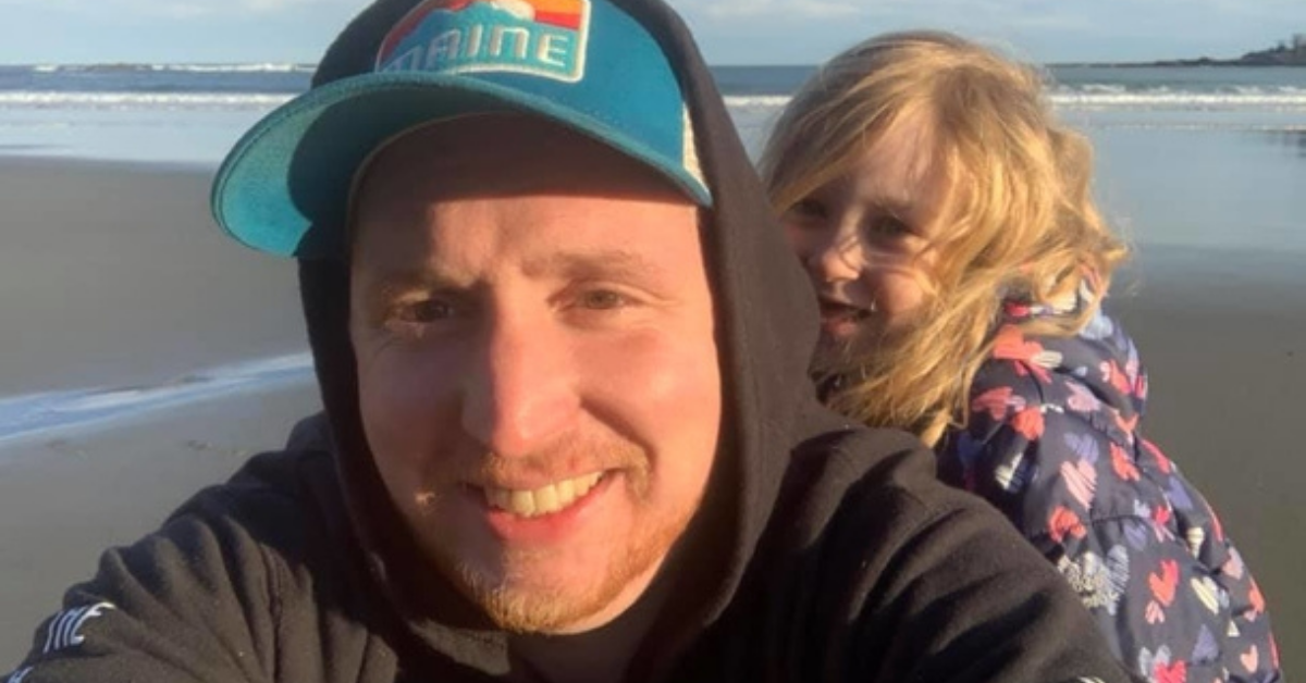 kyle takes a selfie with macie at the beach